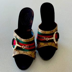 GUCCI
Beige/Ebony GG Canvas Vintage Web Horsebit Wood Mule Slide Sandals